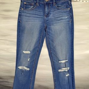 Express Jeans size 28 (about a 4) long, distressed in the front. Like new.